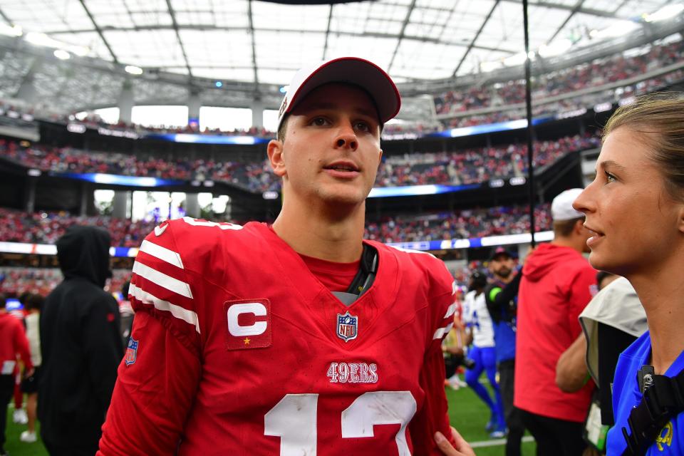 San Francisco 49ers quarterback Brock Purdy (13) celebrates the victory against the Los Angeles Rams at SoFi Stadium in Inglewood on Sept. 17, 2023