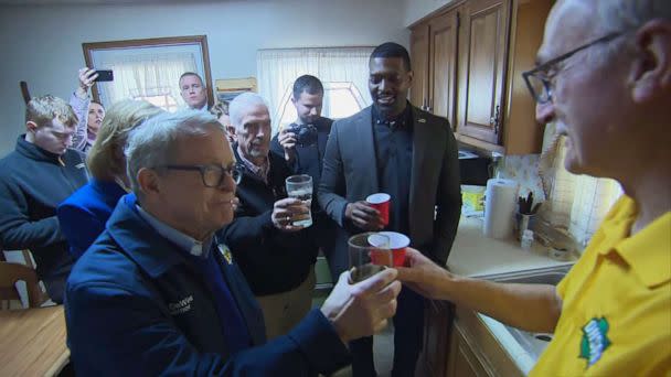 PHOTO: Ohio Gov. Mike DeWine, left, and EPA Administrator Michael Regan, second from right, drink tap water with residents and other officials at a home in East Palestine, Ohio, Feb, 21, 2023, following the Feb. 3 train derailment and chemical fire. (ABC News)