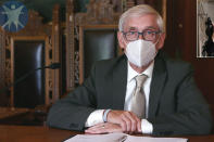 FILE - This July 30, 2020, image taken from video by the Wisconsin Department of Health Services shows Wisconsin Gov. Tony Evers in Madison, Wis. Gov. Evers has issued a new statewide mask order an hour after the Republican-controlled Legislature voted to repeal his previous mandate on Thursday, Feb. 4, 2021. The Democrat Evers said in a video message Thursday that his priority is keeping people safe and that wearing a mask was the most basic way to do that. The mandate, saying masks are probably the most effective way to slow the spread of COVID-19. (Wisconsin Department of Health Services via the AP, File)