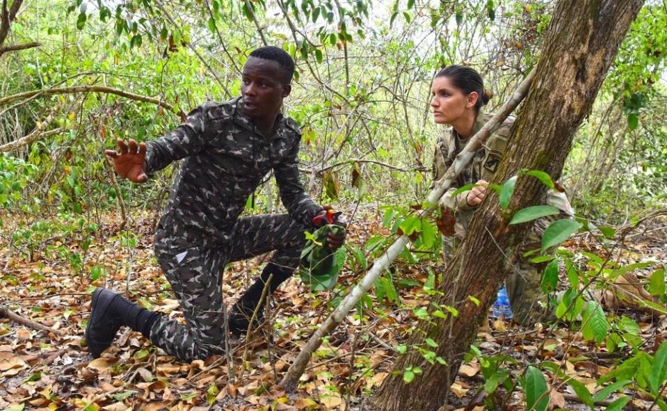 A team member from U.S. Army Civil Affairs Team 8324, 83rd Civil Affairs Battalion, provides guidance on site exploitation for Gabonese park rangers known as EcoGuards during counter illicit trafficking training in September 2018 in Loango National Park, Gabon, Africa.