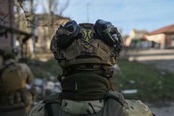 <div class="inline-image__caption"><p>A Ukrainian service member stands outside his outpost in Bakhmut during a drone reconnaissance operation on Dec. 1, 2022. </p></div> <div class="inline-image__credit">Justin Yau</div>