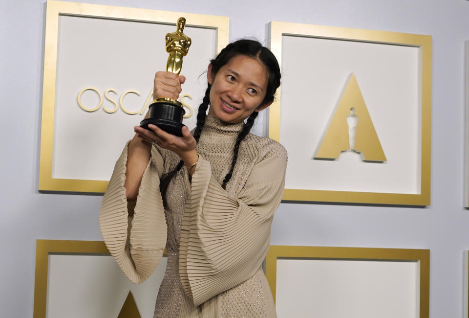 Director/Producer Chloe Zhao, winner of the award for best picture for "Nomadland," poses in the press room at the Oscars on Sunday, April 25, 2021, at Union Station in Los Angeles. (AP Photo/Chris Pizzello, Pool)