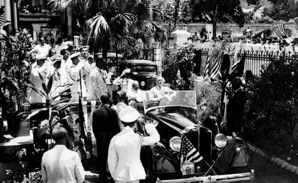 U.S. President Franklin D. Roosevelt, right, and Haitian President Sténio Joseph Vincent, ride in a car that carried them to the Union Club in the northern port city of Cap-Haïtien, Haiti, July 6, 1934. Roosevelt was the first U.S. president to visit Haiti. The United States’ 19-year occupation would end a month later.