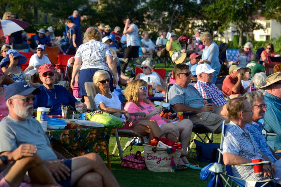 The crowd listens to Not Quite Fab: A Tribute to the Beatles, perform for the crowd Sunday, August 20, 2017 during the 2017 Blues Angel Music Blues on the Bay Summer Concert Series at Community Maritime Park.