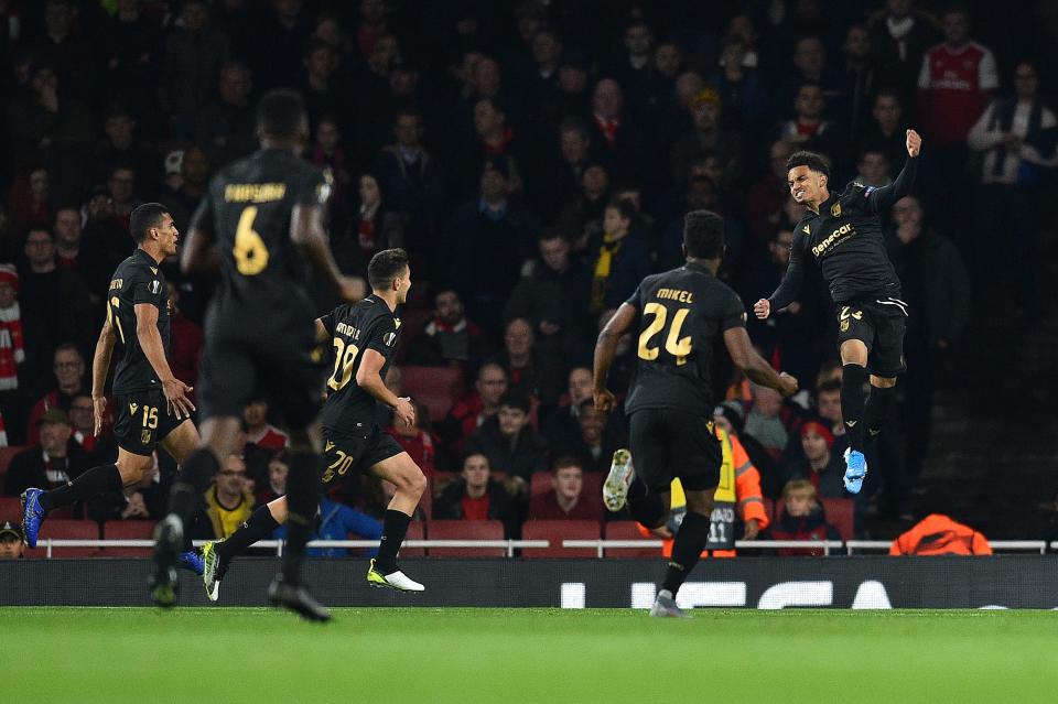 Vitoria Guimaraes' English midfielder Marcus Edwards (R) celebrates scoring the opening goal during their UEFA Europa league Group F football match between Arsenal and Vitoria Guimaraes at the Emirates stadium in London on October 24, 2019. (Photo by Glyn KIRK / AFP) (Photo by GLYN KIRK/AFP via Getty Images)