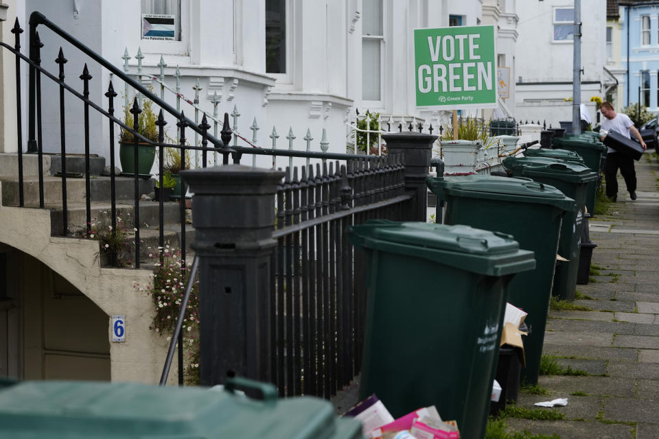 A Vote Green placard is displayed in the front garden of a house in the Round Hill Ward in Brighton, East Sussex, England, Wednesday, June 12, 2024. There’s lots of talk of change in Britain’s election campaign, but little talk about climate change. The U.K.’s July 4 vote to choose a new government comes after one of the wettest and warmest winters on record, part of trends scientists attribute to global warming. (AP Photo/Kirsty Wigglesworth)
