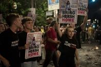 Supporters of Israeli-American hostage Hersh Goldberg-Polin, who was kidnapped on Oct. 7, 2023, protest outside of Israeli Prime Minister Benjamin Netanyahu's residence to demand a deal for the immediate release of all hostages, after Hamas released a video of Goldberg-Polin, in Jerusalem, Wednesday, April 24, 2024. (AP Photo/Maya Alleruzzo)