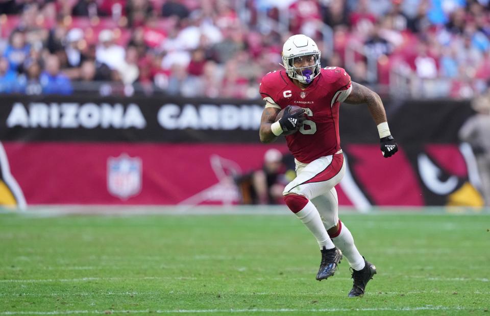 Nov 27, 2022; Glendale, AZ, USA; Arizona Cardinals running back James Conner (6) runs the ball against the Los Angeles Chargers in the second half at State Farm Stadium. Mandatory Credit: Joe Camporeale-USA TODAY Sports
