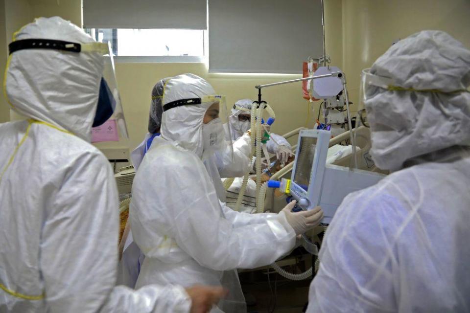 A patient infected with COVID-19 is treated at the Intensive Care Unit of the Santa Casa de Misericordia Hospital in Porto Alegre, Brazil, on August 13, 2020.  / Credit: SILVIO AVILA/AFP via Getty