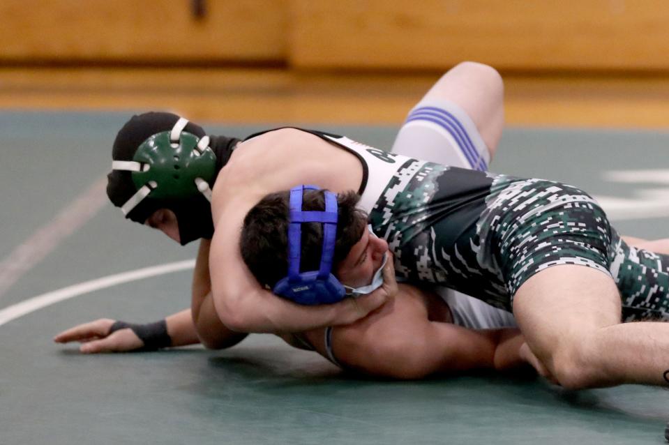 Pleasantville's Christian Perlleshi pinned Shawn O'Mara, Jr. of Hendrick Hudson in a 138 pound match during a dual wrestling meet at Pleasantville High School Dec. 7, 2021.