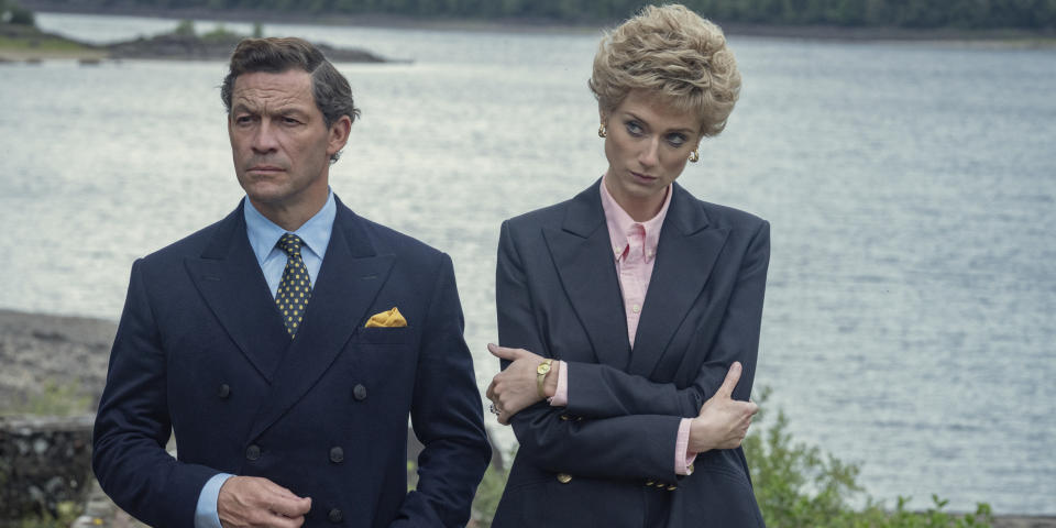 This image released by Netflix shows Dominic West as Prince Charles, left, and Elizabeth Debicki as Princess Diana in a scene from 'The Crown." (Keith Bernstein/Netflix via AP_