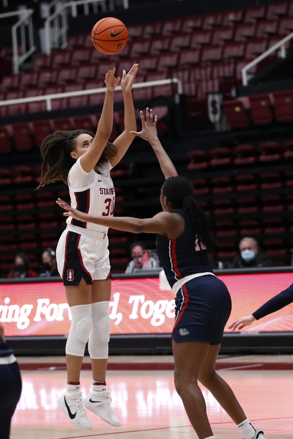 Stanford guard Haley Jones (30) aims for the basket to score against Gonzaga forward Yvonne Ejim (15) during the first half of an NCAA college basketball game Sunday, Jan. 9, 2022, in Stanford, Calif. (AP Photo/Josie Lepe)