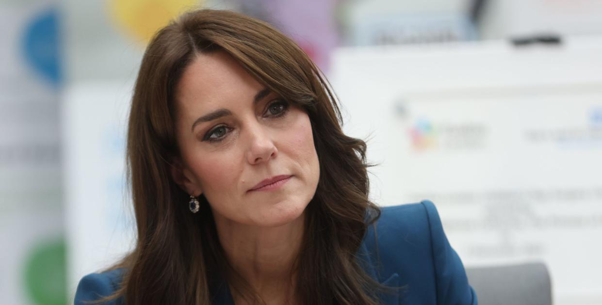 catherine, princess of wales sits and listens to people talking during an event at a hospital