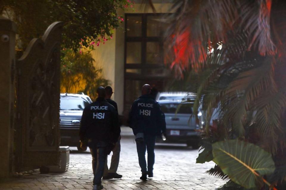 Federal agents outside the two Star Island mansions of Sean ‘Diddy’ Combs on Monday, March 25, 2024, in Miami Beach, Florida. Federal agents raided his two Miami Beach mansions, along with raiding his home in Los Angeles. The raids follow a suit by his ex producer alleging Diddy was engaged in a ‘widespread and dangerous criminal sex trafficking organization Alexia Fodere/for The Miami Herald