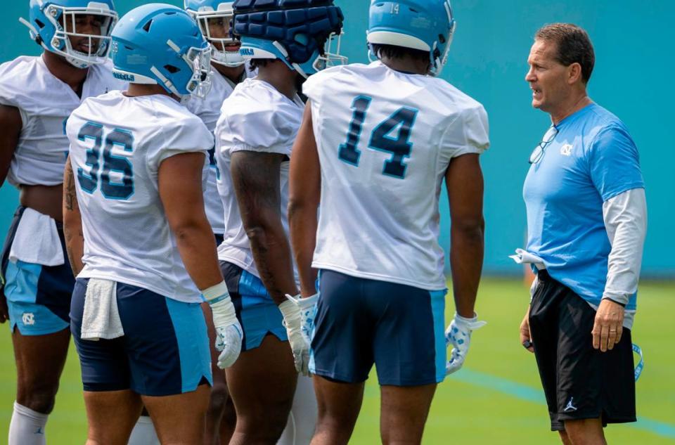 North Carolina assistant head coach for defensive Gene Chizik works with his players during the first day of practice on Wednesday, August 2, 2023 in Chapel Hill, N.C. Robert Willett/rwillett@newsobserver.com