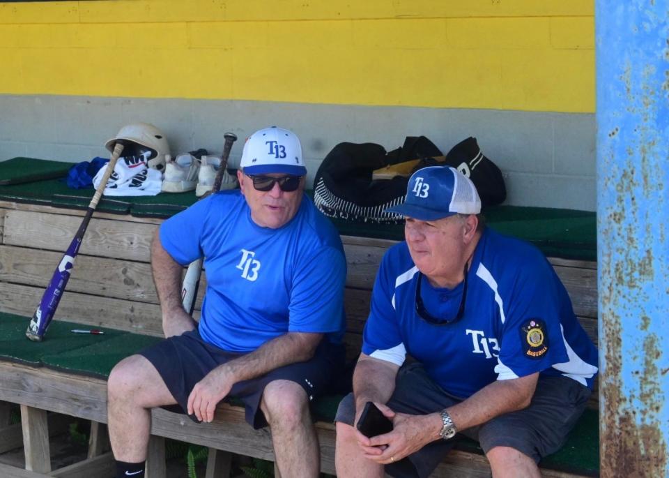 Wes Singletary (left) and Doug Treadway (right) holds a conversation during Post 13 baseball practice at Tallahassee Community College’s Eagle Field, June 8, 2022