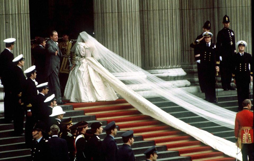 5) Her Gown (and Veil) Were Some of the Longest in History