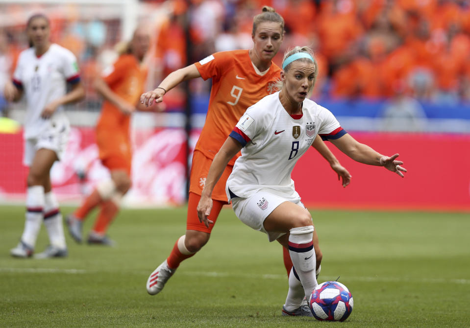 United States' Julie Ertz, right, controls the ball in front of Netherlands' Vivianne Miedema during the Women's World Cup final soccer match between US and The Netherlands at the Stade de Lyon in Decines, outside Lyon, France, Sunday, July 7, 2019. (AP Photo/Francisco Seco)