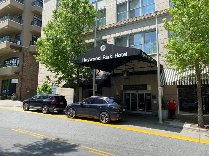 Patrons enter the Haywood Street hotel in downtown Asheville on May 5, 2022.