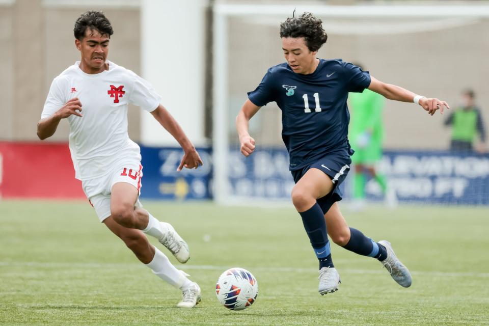 Manti’s Luis Ornelas and Juan Diego’s James Fitzpatrick compete for the ball in a 3A boys soccer state semifinal at Zions Bank Stadium in Herriman on Wednesday, May 10, 2023. | Spenser Heaps, Deseret News