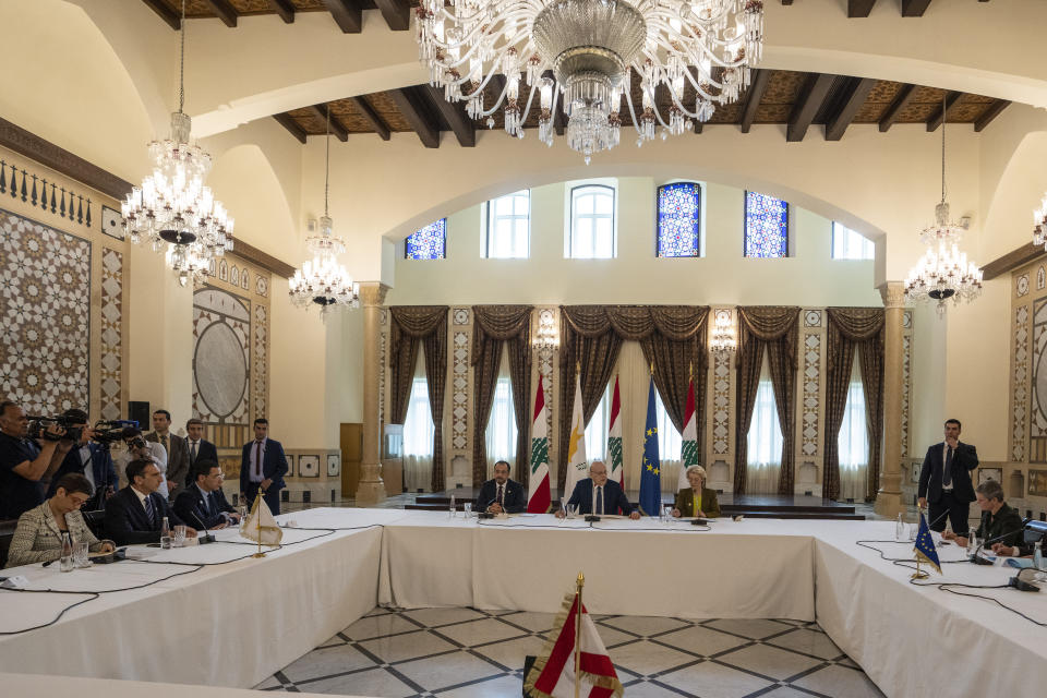 Lebanese caretaker Prime Minister Najib Mikati, center, speaks during his meeting with Cyprus' President Nikos Christodoulides, left, and President of the European Commission Ursula von der Leyen at the government palace in Beirut, Lebanon, Thursday, May 2, 2024. (AP Photo/Hassan Ammar)