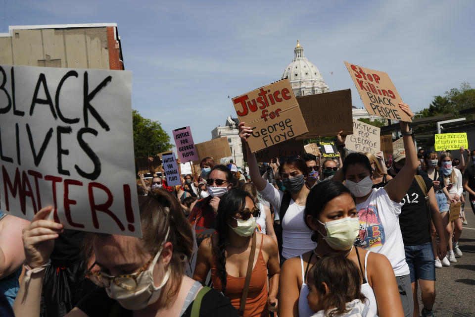 Protesters march away from the State Capitol, Sunday, May 31, 2020, in St. Paul, Minnesota, demanding justice for George Floyd. Source: AP