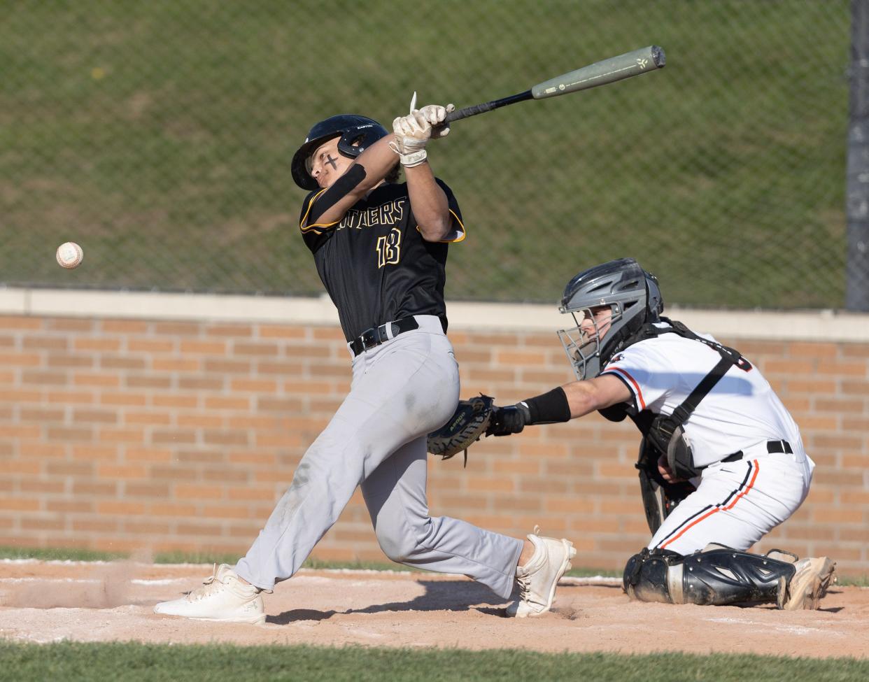 Perry batter Christian Ivanic hits a double in the fifth inning against Massillon at Massillon Wednesday, April 26, 2023.
