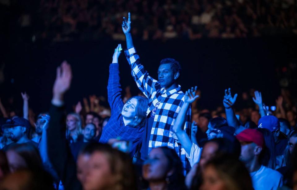 Fans cheer as DJ Drama takes the stage during Snoop Dogg’s High School Reunion Tour at Sacramento’s Golden 1 Center on Friday, Aug. 25, 2023, with Wiz Khalifa, Too $hort, Warren G and Berner.