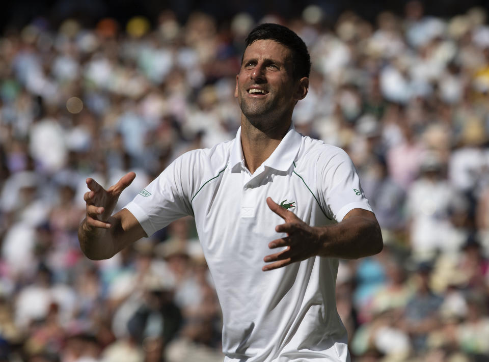 LONDON, ENGLAND - JULY 10: Novak Djokovic of Serbia celebrates victory after his match against Nick Kyrgios of Australia during their Men's Singles Final match on day fourteen of The Championships Wimbledon 2022 at All England Lawn Tennis and Croquet Club on July 10, 2022 in London, England. (Photo by Visionhaus/Getty Images)