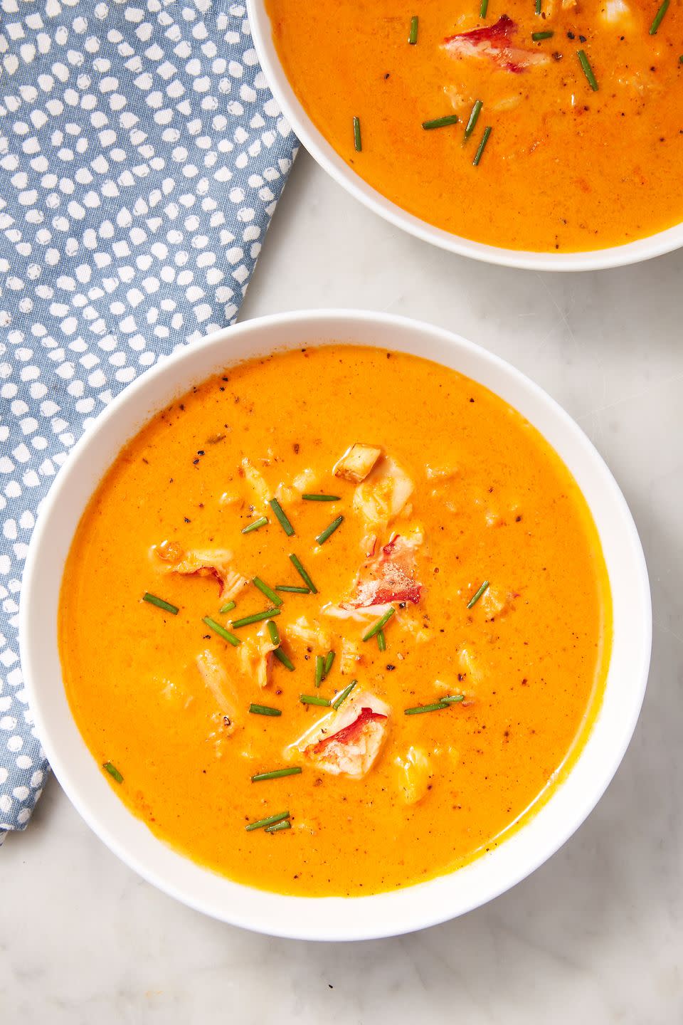 <p>The creamy, cozy soup of your dreams.<br></p><p>Get the <strong><a href="https://www.delish.com/cooking/recipe-ideas/a24797109/lobster-bisque-recipe/" rel="nofollow noopener" target="_blank" data-ylk="slk:Lobster Bisque recipe;elm:context_link;itc:0;sec:content-canvas" class="link ">Lobster Bisque recipe</a>. </strong></p>