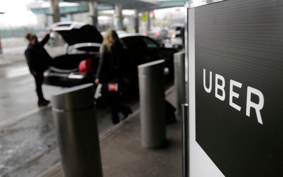 Uber paid hackers $100,000 (£75,500) to delete the stolen data  - AP