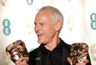 Martin McDonagh with two of his awards for Three Billboards Outside Ebbing, Missouri at the British Academy Film Awards in 2018 (Yui Mok/PA Wire).