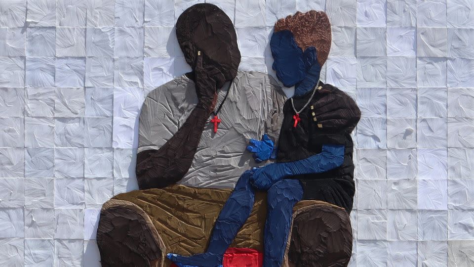 Tesprit worked with the soles of flip flops salvaged from landfill to create a 3D sculpture depicting fatherhood to complement Mr Eazi's song 'Mandela." - Courtesy the artist