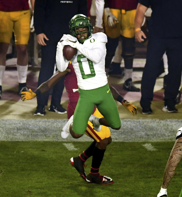 Ducks defend Pac-12 crown with 31-24 win over USC - The Columbian