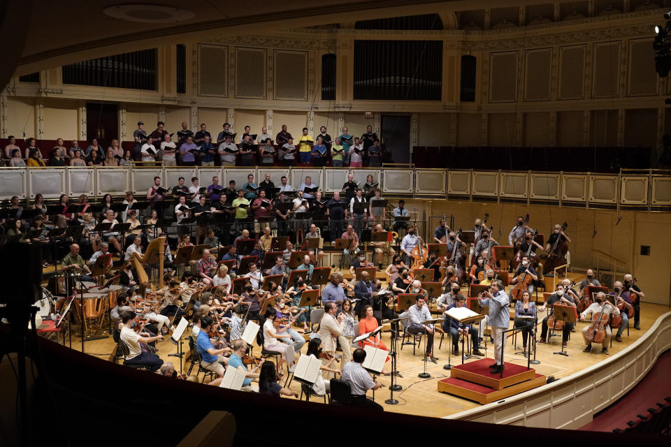 Italian conductor Riccardo Muti, 80, rehearses Verdi's "Un Ballo in Maschera (A masked Ball)" with the Chicago Symphony Orchestra in Chicago on Wednesday, June 22, 2022. Muti, whose Chicago contract runs through the 2022-23 season, considers himself the descendant of strong Italian conductors reaching back to Arturo Toscanini and Tulio Serafin. (AP Photo/Nam Y. Huh)