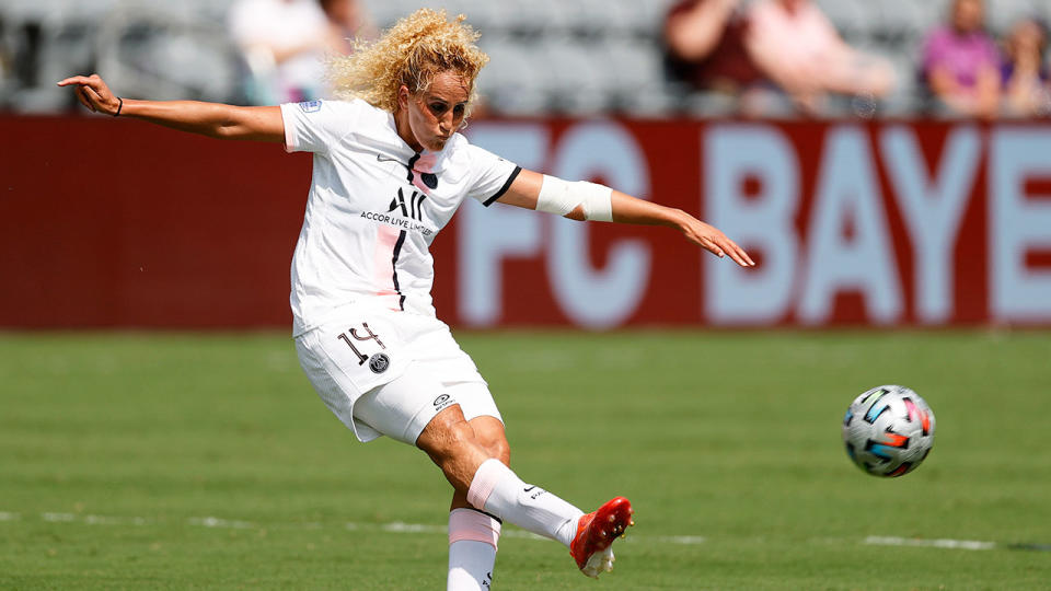 Pictured here, Kheira Hamraoui kicks a ball during a game for PSG women's side.