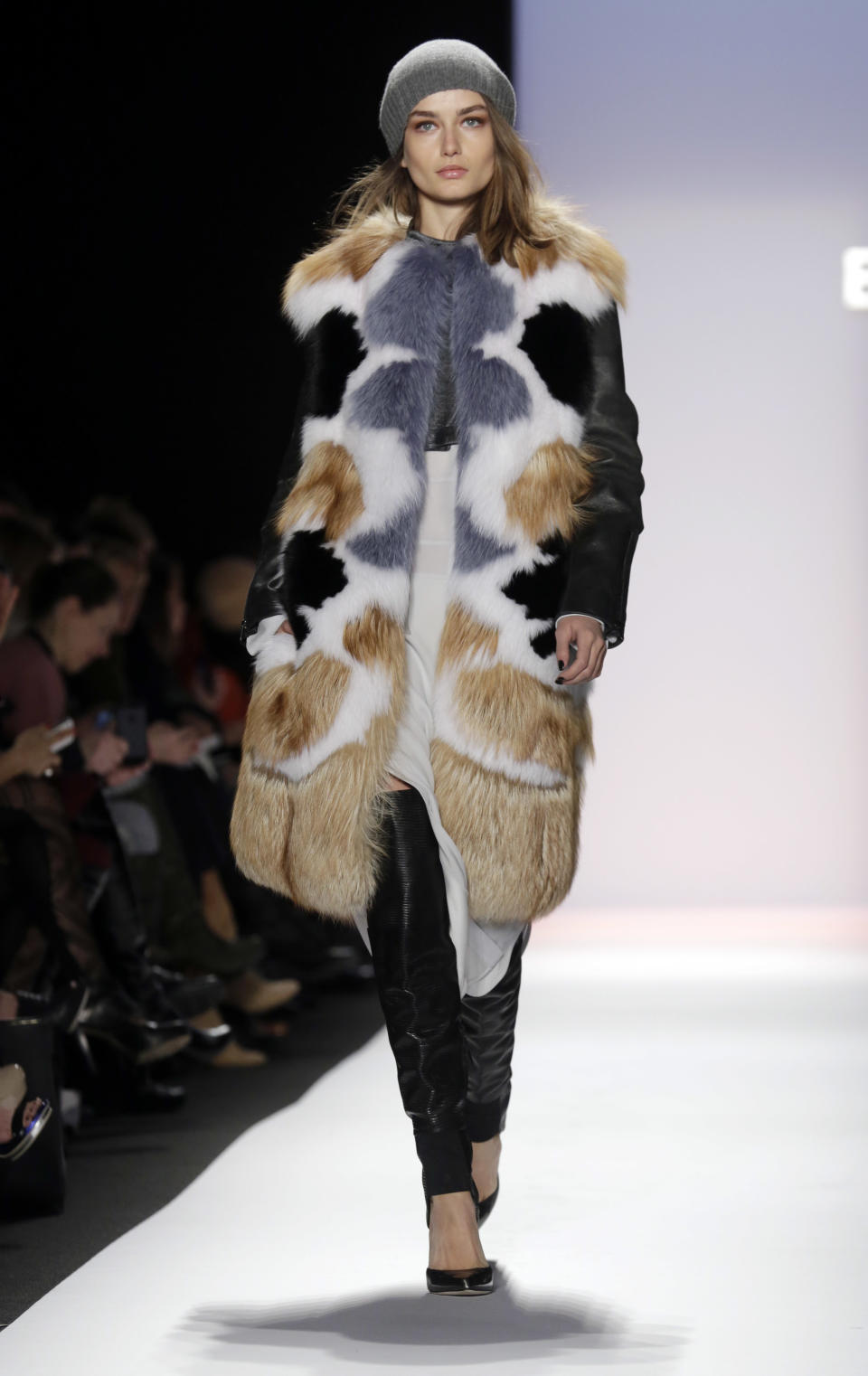 The BCBG Max Azria Fall 2013 collection is modeled during Fashion Week in New York on Thursday, Feb. 7, 2013. (AP Photo/Richard Drew)