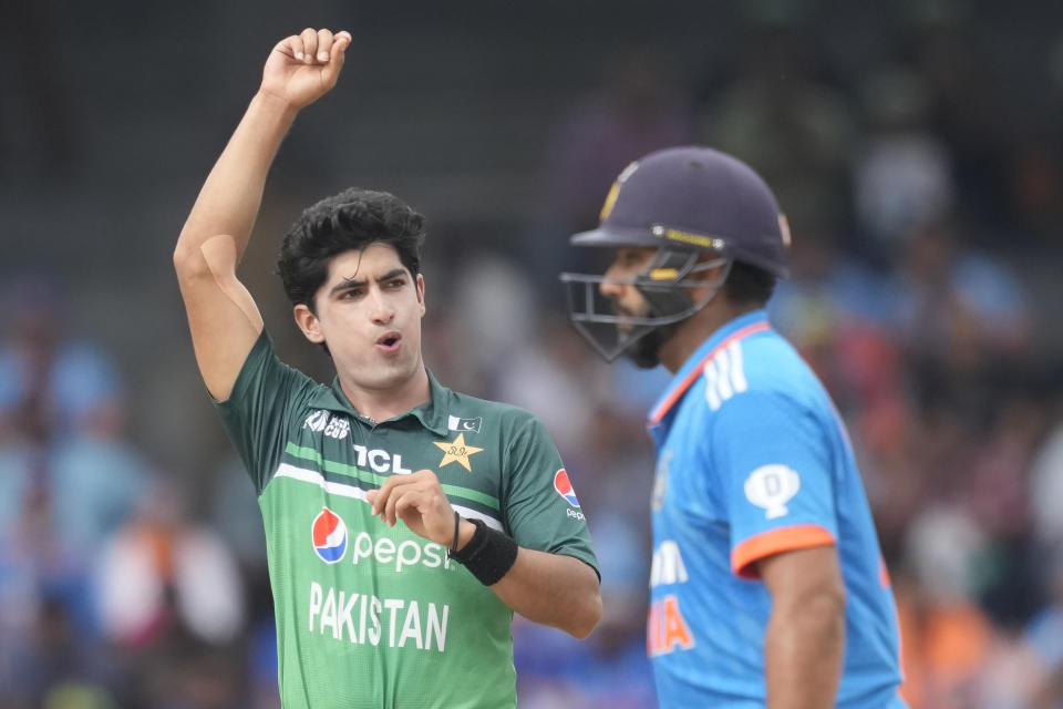 Pakistan's Naseem Shah, left, gestures as he unsuccessfully appeals for the wicket of India's Rohit Sharma during the Asia Cup cricket match between India and Pakistan in Colombo, Sri Lanka, Sunday, Sept.10, 2023. (AP Photo/Eranga Jayawardena)