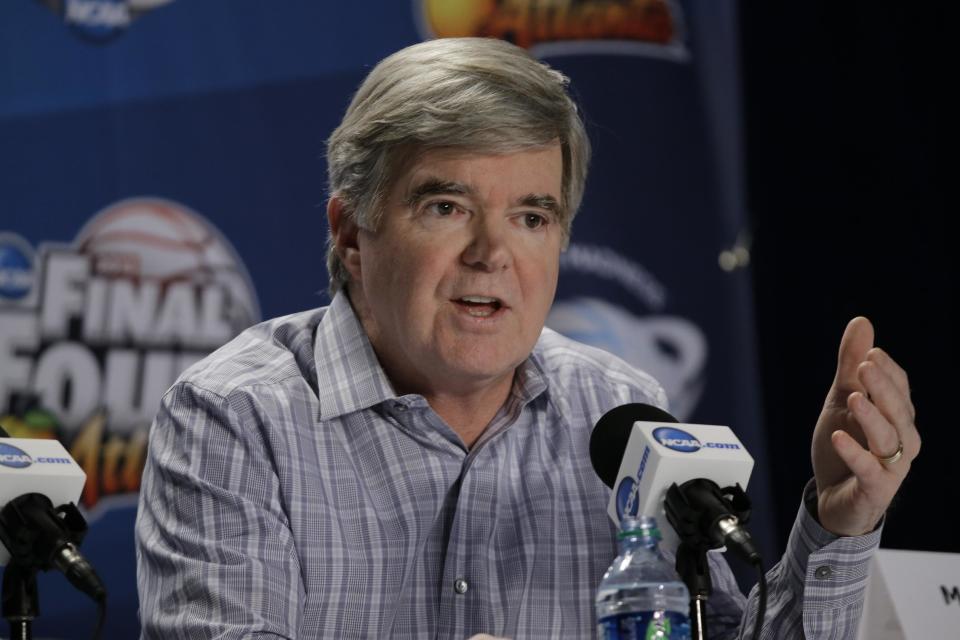 FILE - In this April 4, 2013, file photo, NCAA President Mark Emmert speaks at a news conference in Atlanta. Big as March Madness and the Final Four have become, they are not big enough to blot out the storm clouds on the horizon. (AP Photo/David J. Phillip, File)