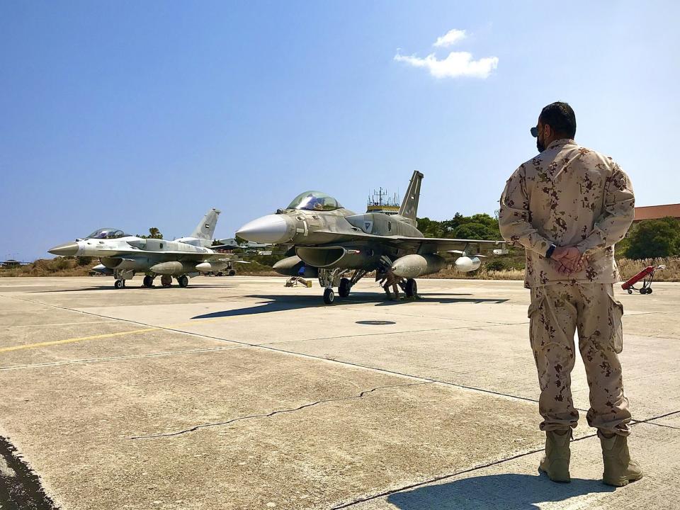 In this photo provided by the Greek Defense Ministry, air force jets from the United Arab Emirates arrive at the airbase of Souda to take part in a joint training with Greek forces, on the southern island of Crete, Greece, on Thursday, Aug. 27, 2020. Germany's foreign minister on Thursday called for an end to military drills in the eastern Mediterranean to defuse tensions and create conditions for NATO allies Greece and Turkey to resolve a dispute over offshore energy exploration rights. (Greek Defense Ministry via AP)