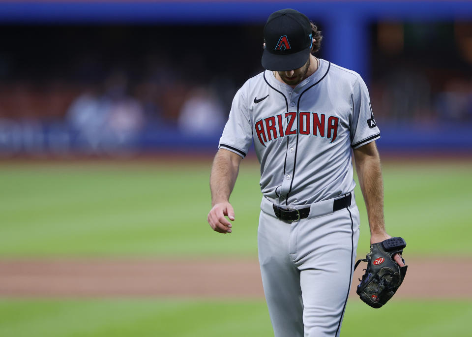 Arizona Diamondbacks pitcher Zac Gallen leaves during the first inning of the team's baseball game against the New York Mets, Thursday, May 30, 2024, in New York. (AP Photo/Noah K. Murray)