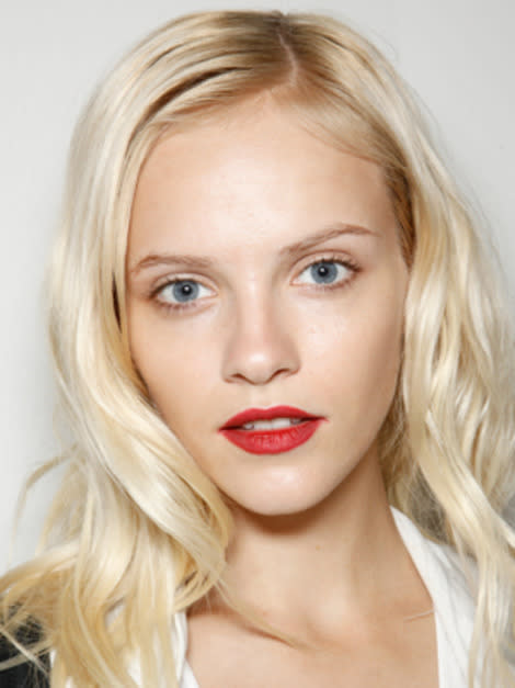 Follow these tips to get a gorgeous complexion like this model backstage at the Burberry Prorsum spring 2013 runway show.