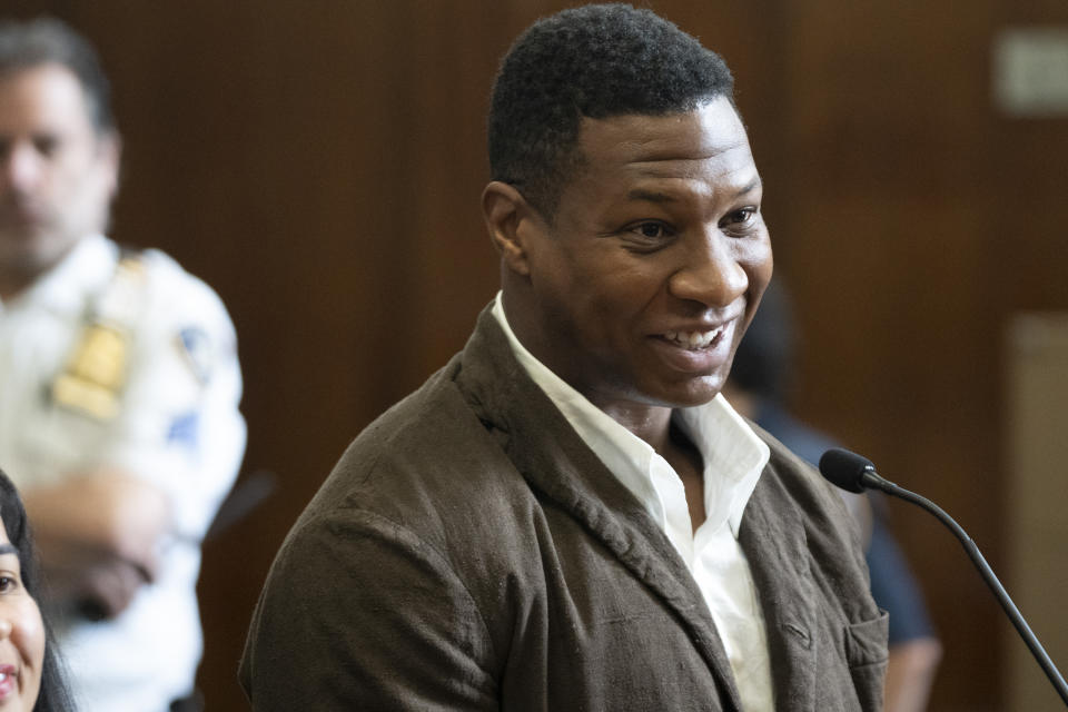 Jonathan Majors stands in court during a hearing in his domestic violence case, Tuesday, June 20, 2023 in New York. Majors’ domestic violence case will go to trial Aug. 3, the judge said Tuesday, casting him in a real-life courtroom drama as his idled Hollywood career hangs in the balance.(AP Photo/Steven Hirsch, Pool)