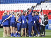 United States' players take photos during a visit at the Parc des Princes stadium a day before the Group F soccer match between United States and Chile at the Women's World Cup in Paris, Saturday, June 15, 2019. (AP Photo/Alessandra Tarantino)