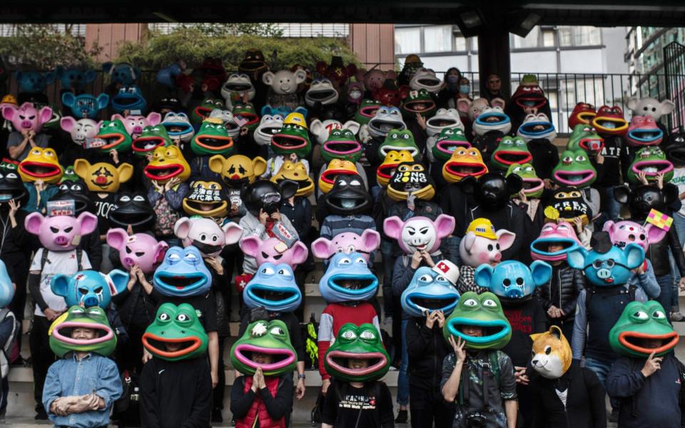 Demonstrators wear Pepe masks during a pro-democracy rally in Hong Kong