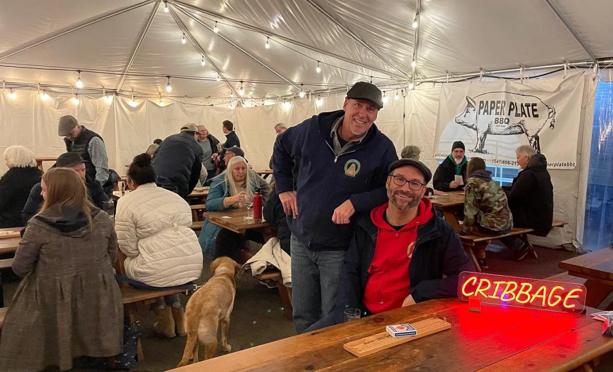 Bill McClain, left, and Dave Hurst run a cribbage tournament at ColdFire Brewing in Eugene in January.