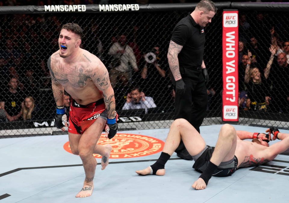 LONDON, ENGLAND - MARCH 19:  Tom Aspinall of England celebrates his submission victory over Alexander Volkov of Russia in a heavyweight fight during the UFC Fight Night event at O2 Arena on March 19, 2022 in London, England. (Photo by Chris Unger/Zuffa LLC)