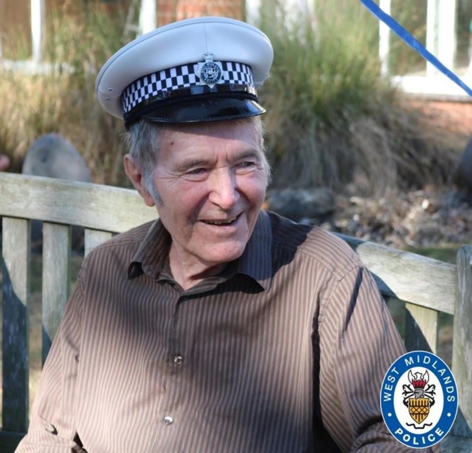 Geoff Brown dons a police hat (West Midlands police)
