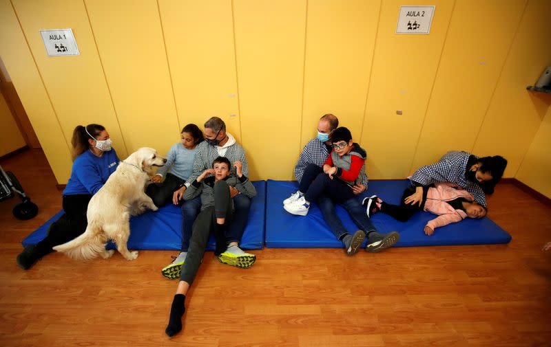 Dog-assisted therapy session at Escola Iris in Sant Vicenc dels Horts