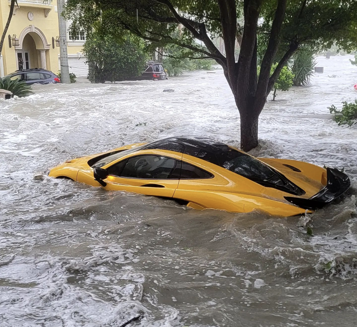 The McLaren P1 submerged by flood waters.
